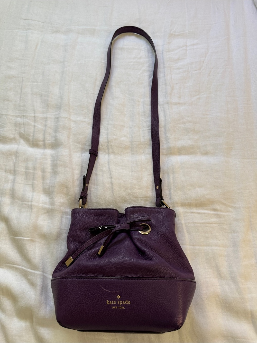 kate spade Deep Plum Pebbled Leather Drawstring Crossbody